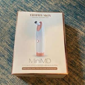 Microdermabrasion home device trophy skin